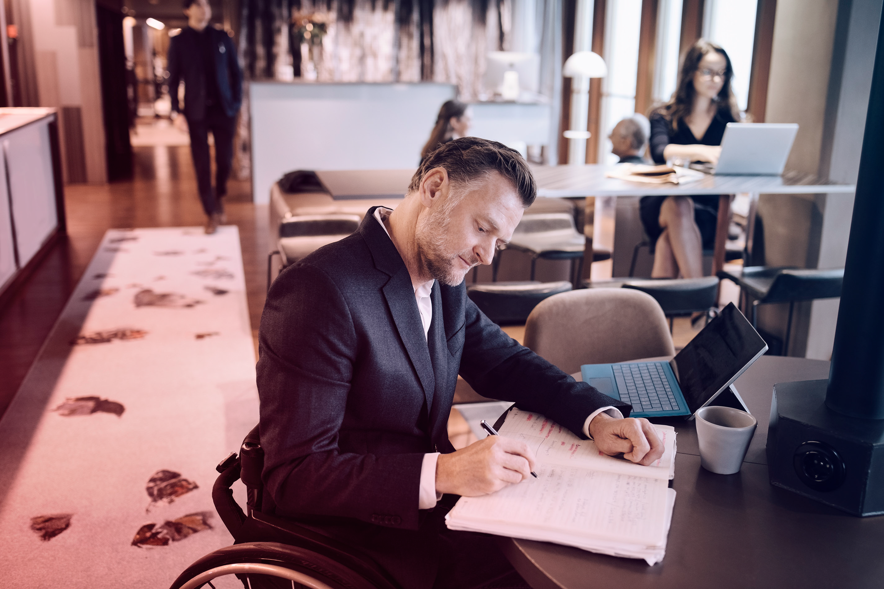 man working by a desk